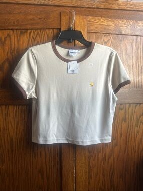 HARI Cream Crop Tee with Brown Ringer Trim and Tiny Yellow Embroidered Motif
